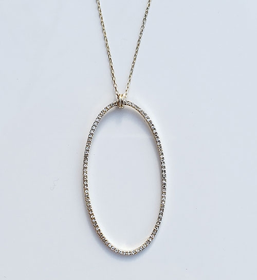Ladies’ 14kt gold oval shaped diamond pendant ...
