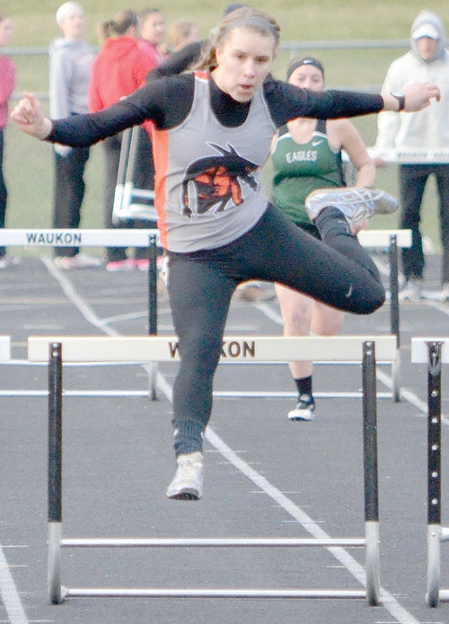 Victory in 400 meter hurdles ...